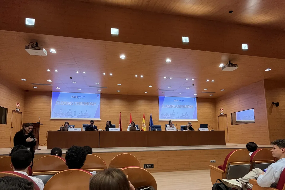 Delegates in session in a full committee hall