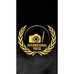 INTERNATIONAL PRESS CORPS